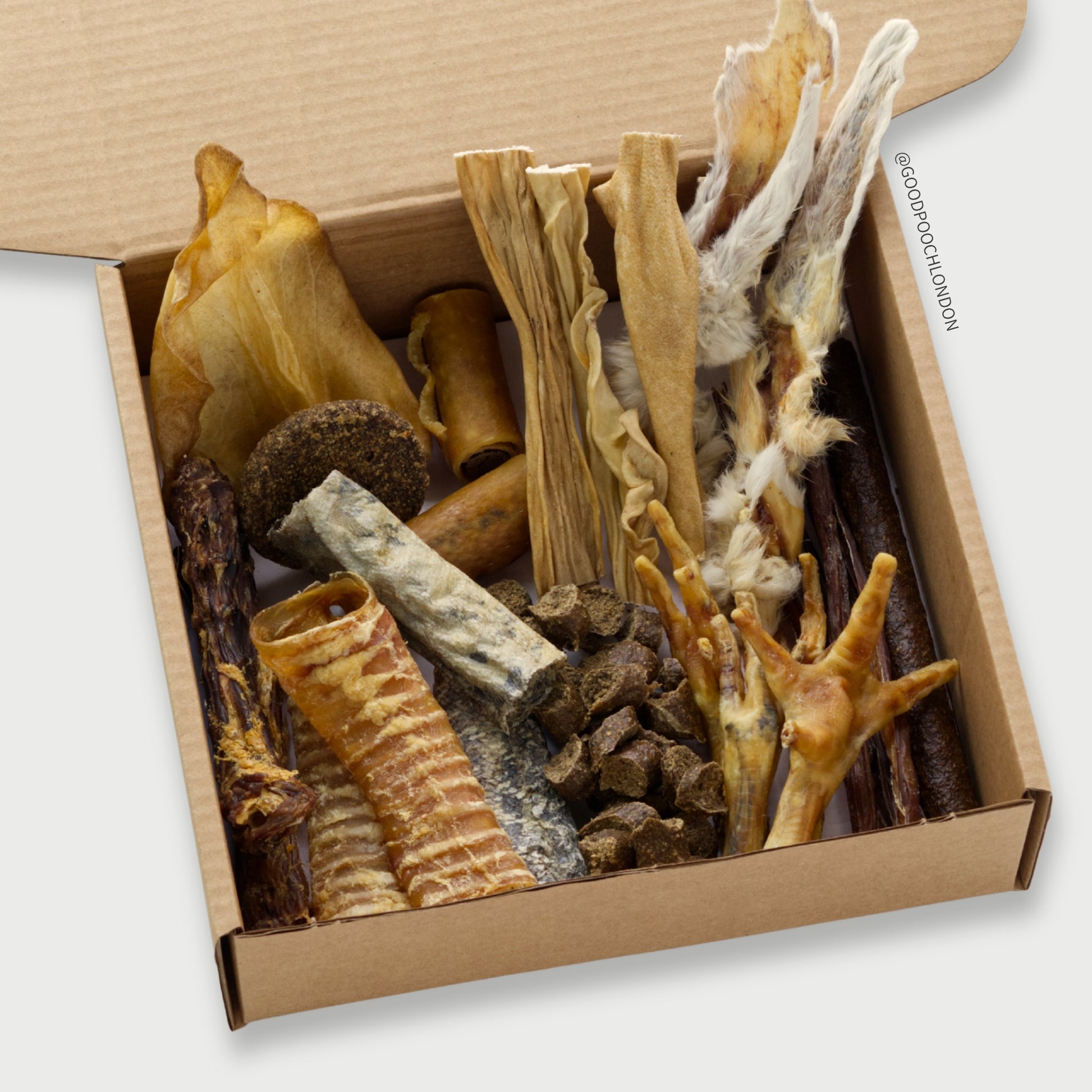 A box of natural air dried dog treats.